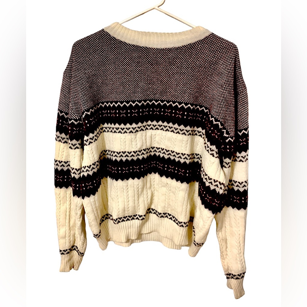 Burgundy and cream sweater.